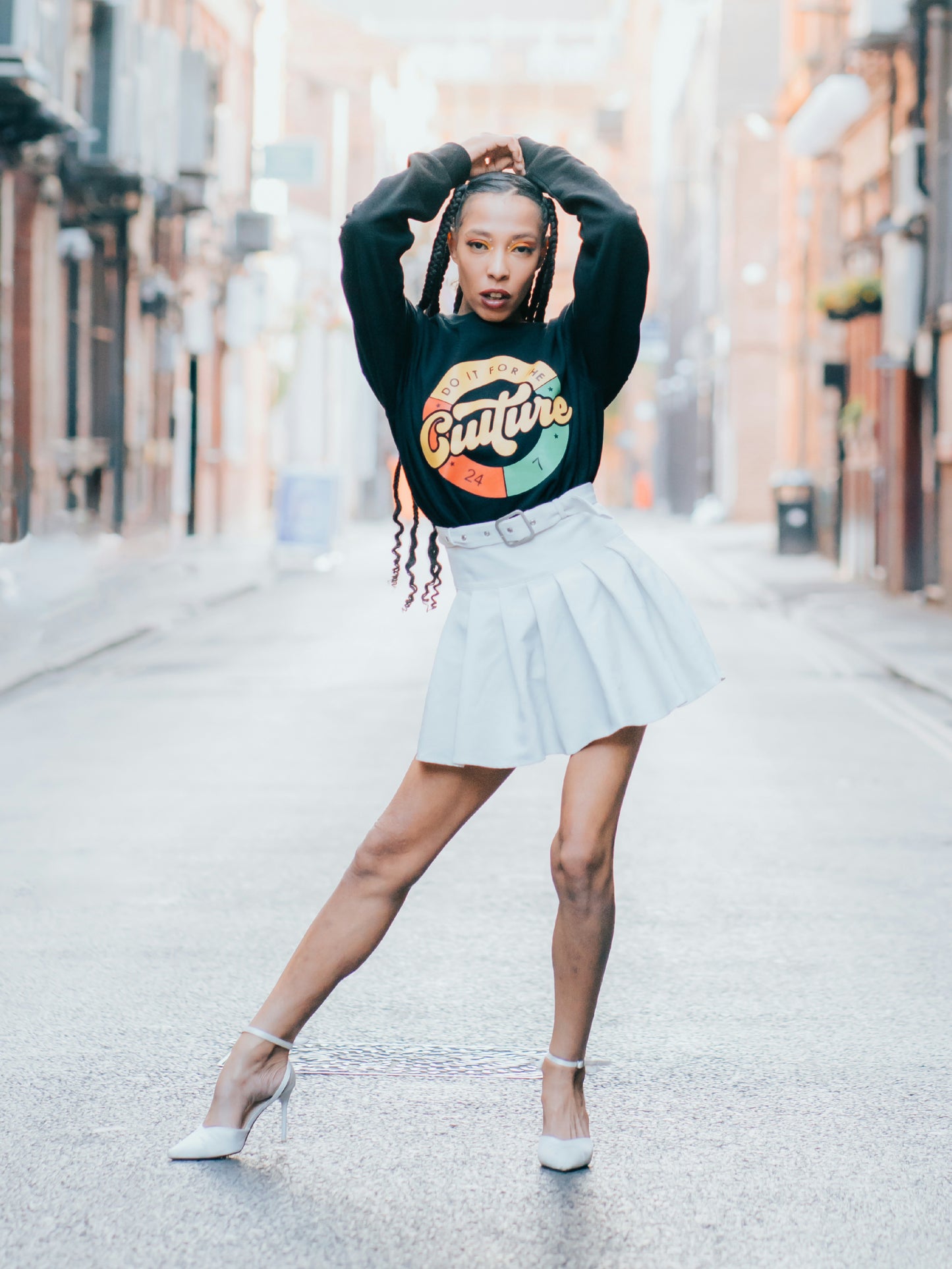 Do It For The Culture women’s black crewneck sweatshirt with multicolor graphic print, streetwear fashion outfit.